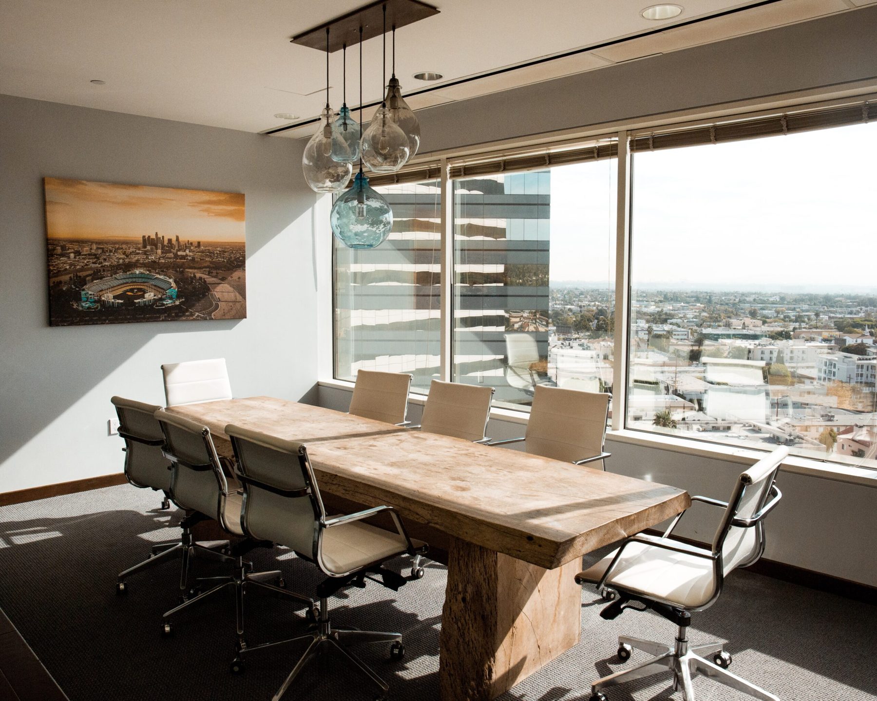 Modern boardroom overlooking a Western Canadian landscape