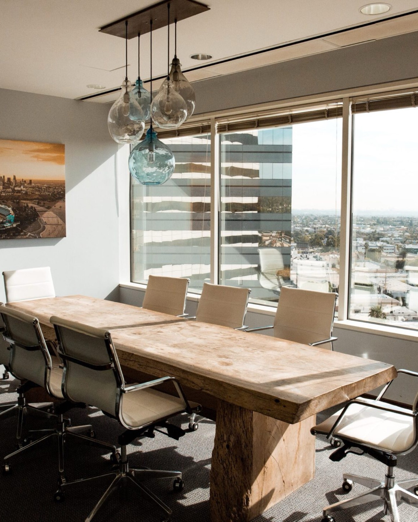 A boardroom overlooking a Western Canadian city